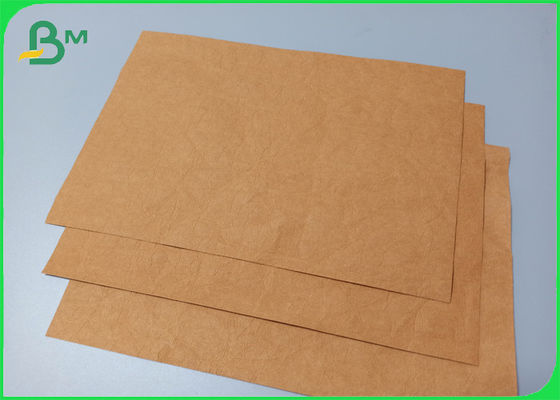 Washable Good Flexibility 0.55mm Kraft Paper Fabric For Recyclable Wallet Making