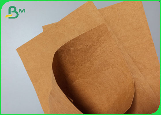 Washable Good Flexibility 0.55mm Kraft Paper Fabric For Recyclable Wallet Making